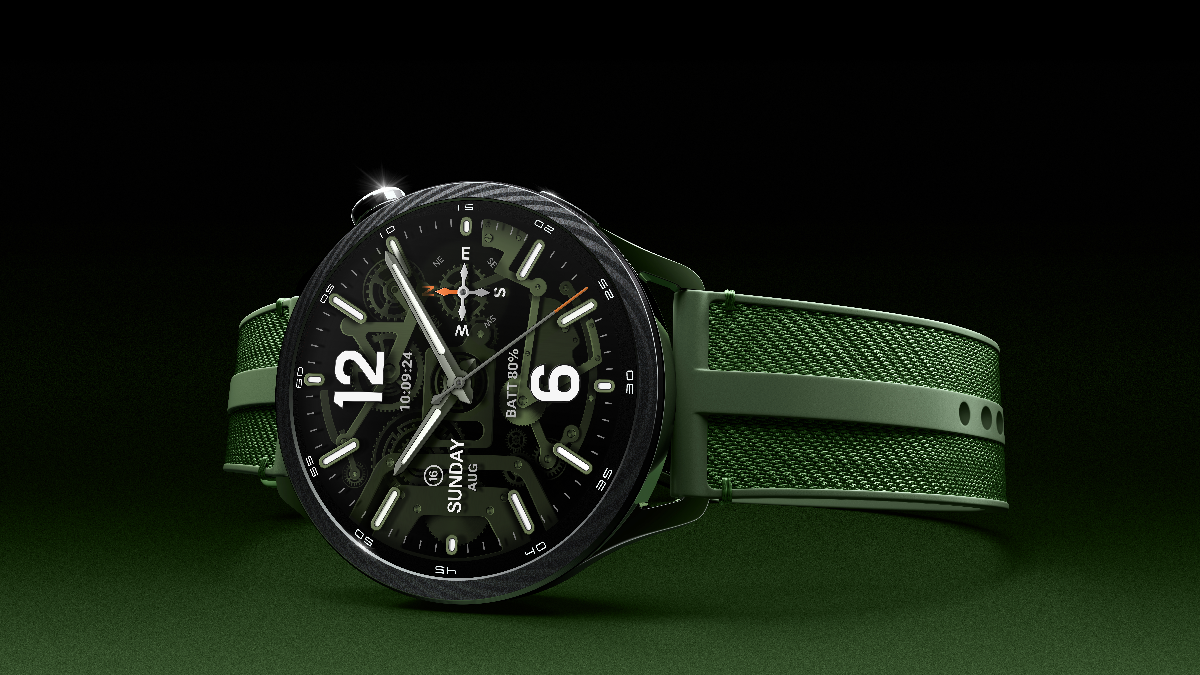 Zielony smartwatch na czarnym tle. Ma okrągłą tarczę z tradycyjnym, przypominającym analogowy zegarek, wyświetlaczem